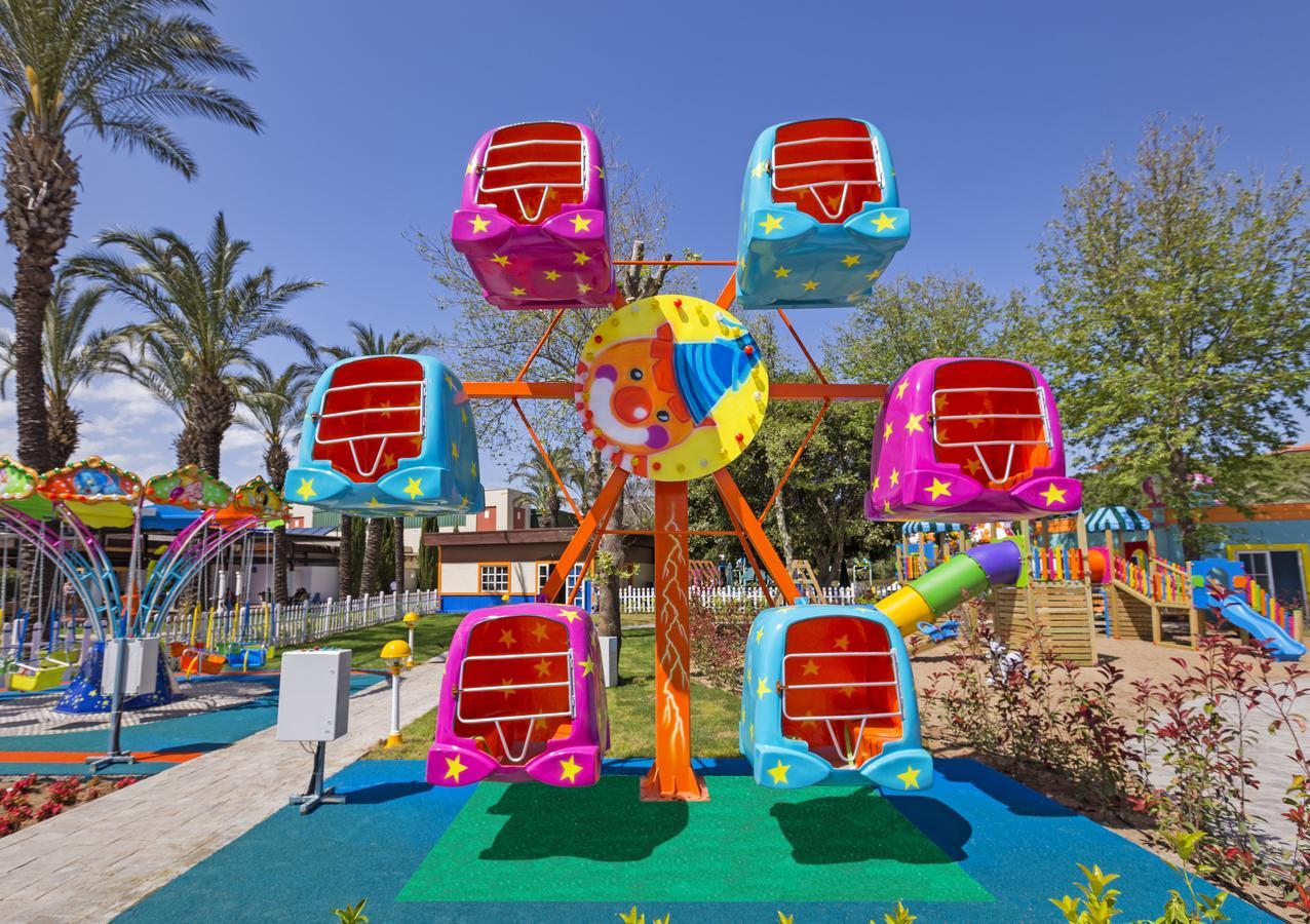 Ic Hotels Green Palace - Kids Concept Antalya Exterior foto A ferris wheel at a children's park